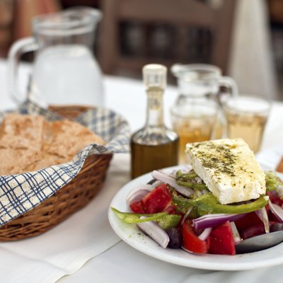 Greek salad with country bread and home made white wine