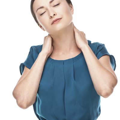 Frustrated young business woman looking tired with hands on her