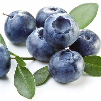 Blueberries with leaves.