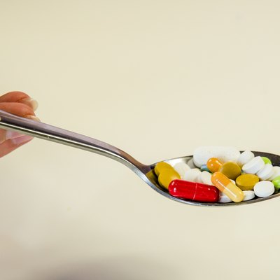 pills on spoon
