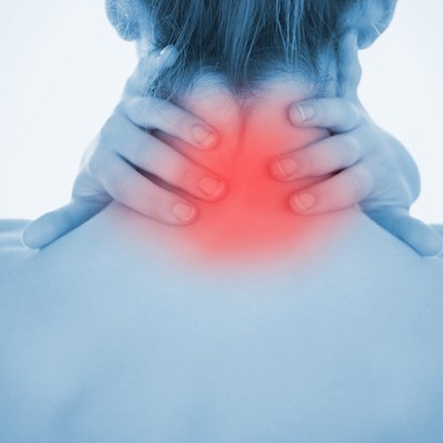 Woman rubbing highlighted neck pain