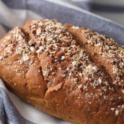 Dark multigrain bread whole grain fresh baked on rustic