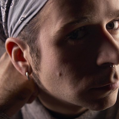 Studio portrait of man wearing bandana