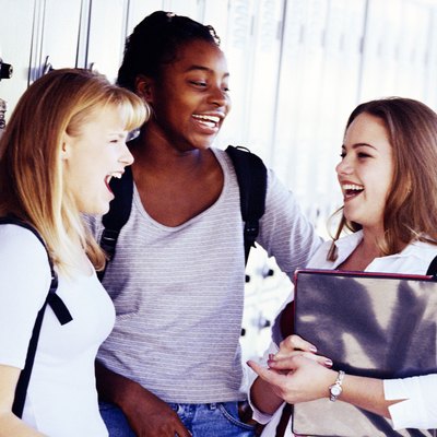 Teenage girls by lockers