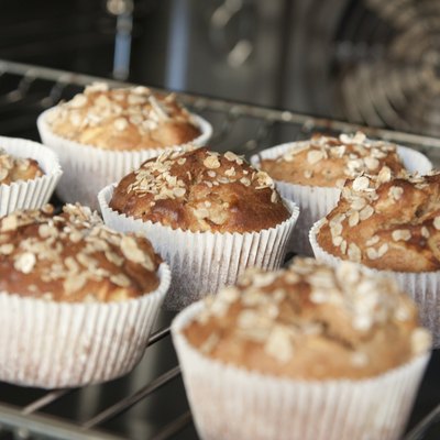 Freshly baked apple muffins with oat flakes