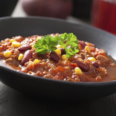 mexican chili con carne in black plate