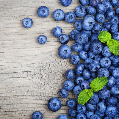 Blueberry on old wood background