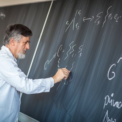 Senior chemistry professor giving a lecture
