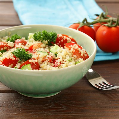 Quinoa salad with cucumber and tomato in a bowl