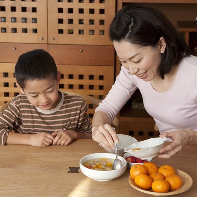 Mother Serving Dessert for Son