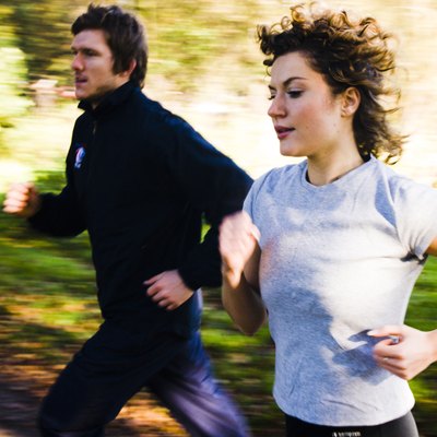 Young couple jogging in a park