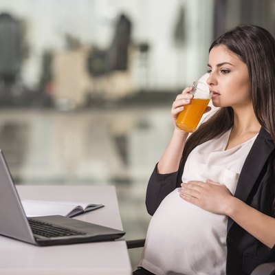 Pregnant businesswoman