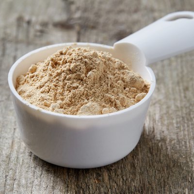 Measuring scoop of maca powder