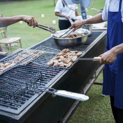 Preparing barbecue for the guests