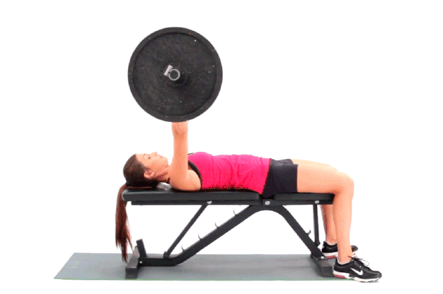 Woman demonstrating how to do a barbell bench press
