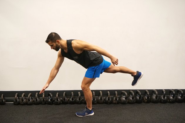 Man demonstrating how to do body-weight single-leg deadlifts