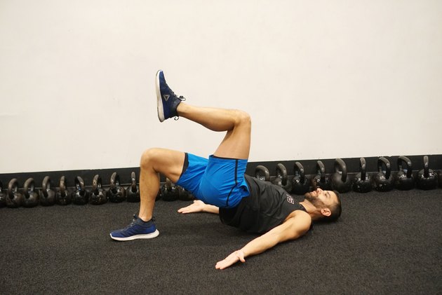 Man demonstrating how to do marching bridges