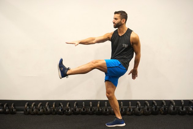 Man demonstrating how to do standing kickouts