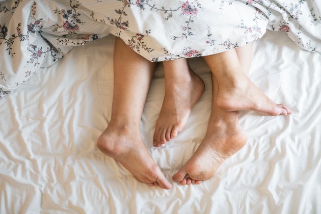 couple feet in bed