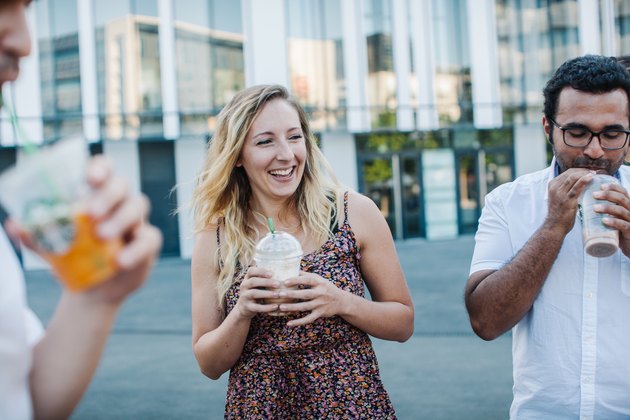 group of friends using non-verbal communication