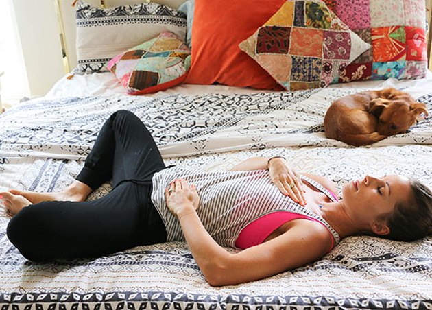woman doing reclining bound angle