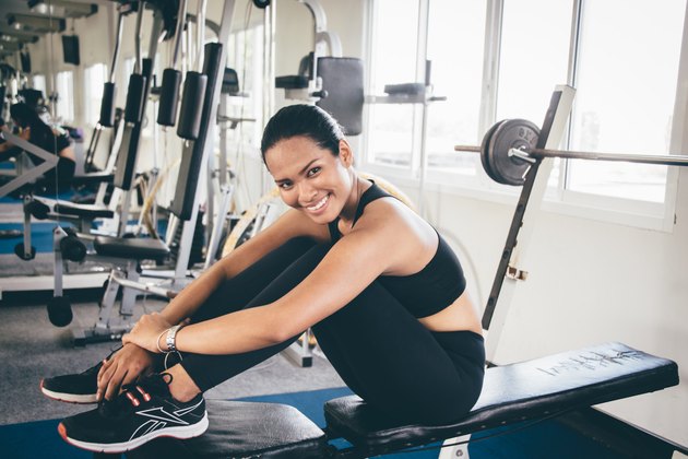 woman happily at the gym
