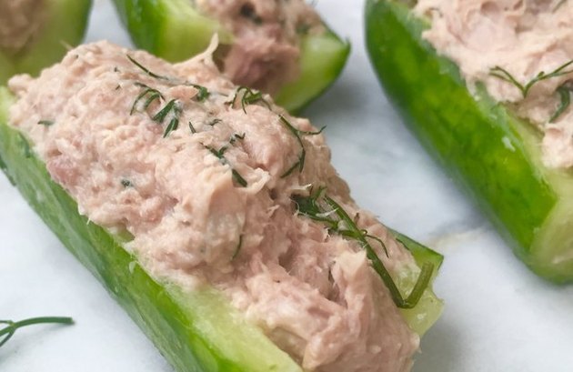 Close view of tuna salad in a hollowed-out cucumber
