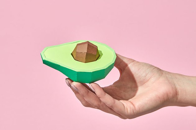 avocado in hand