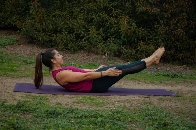 Woman performing core exercise.