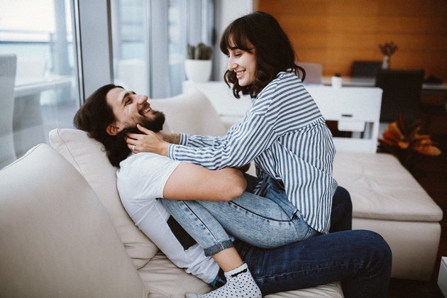 couple cuddling on the couch
