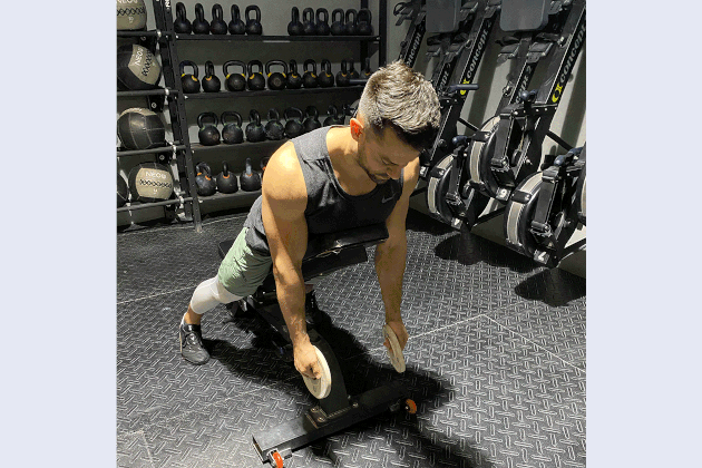 Mathew Forzaglia performing YTMs shoulder exercise.