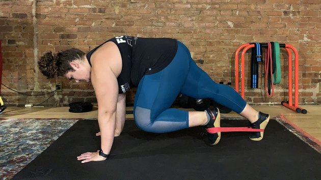 Move 2: Plank With Knee Tuck