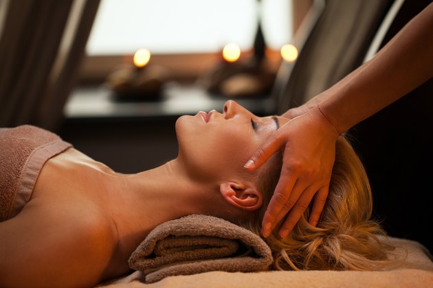 woman enjoys the benefits of a swedish massage