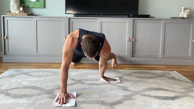 Move 6: Plank Reach Back