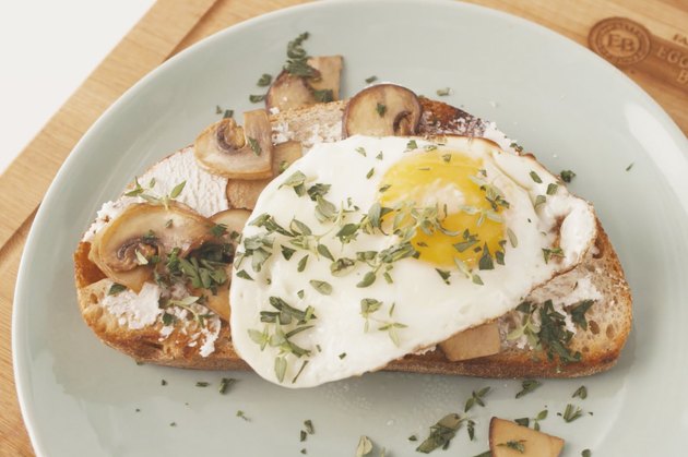 mushroom-ricotta toast with a fried egg