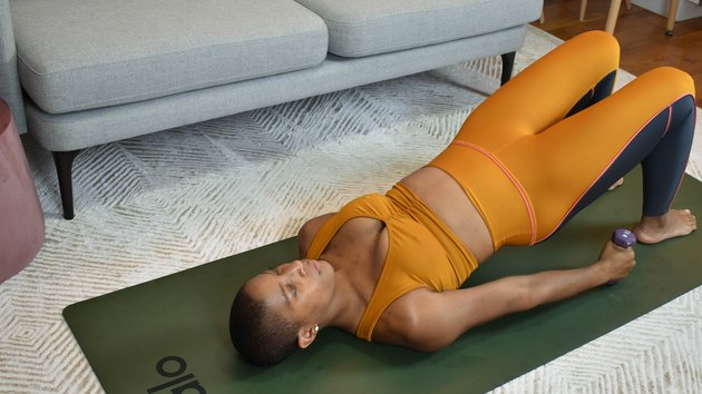 Move 1: Glute Bridge With Front Raise
