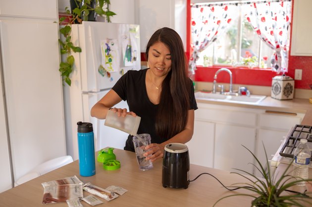 Kristina prepares a protein shake