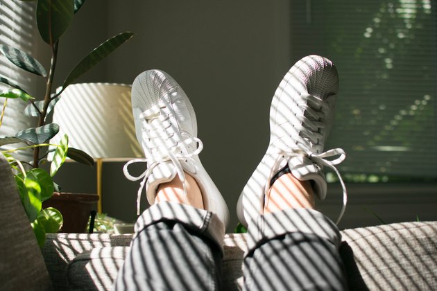 person sitting on couch in therapist’s office