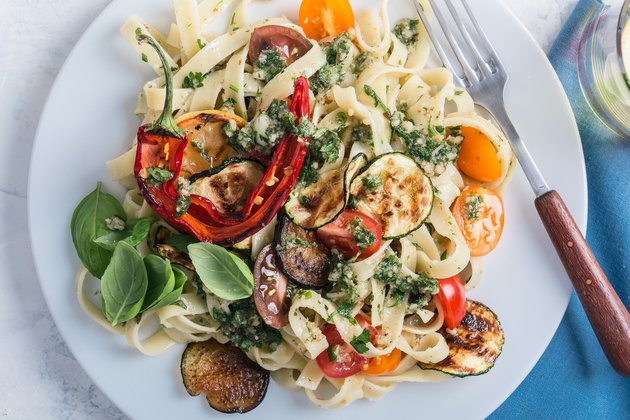 Fettucine with roasted colorful vegetables and parsley pesto