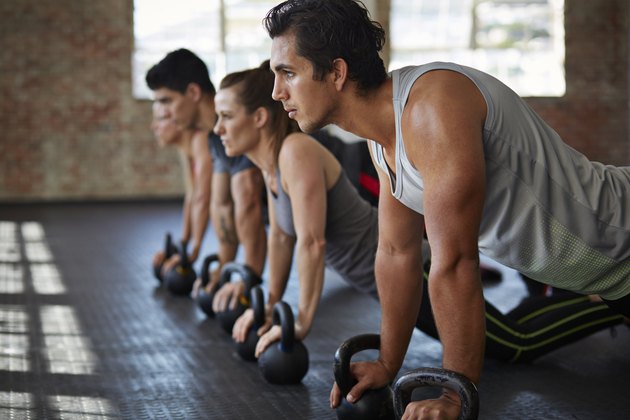 gym class doing push-up's in urban gym
