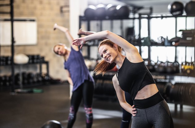 Group of People Exercising at a Gym