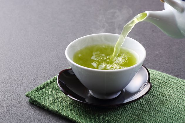 pouring green tea