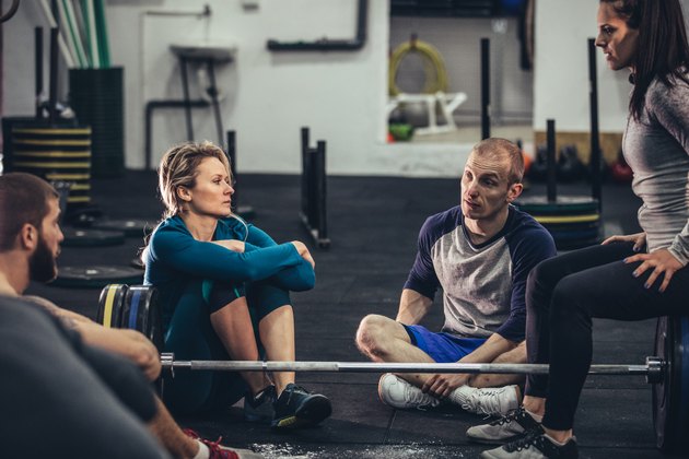 Group of People Resting in a Gym