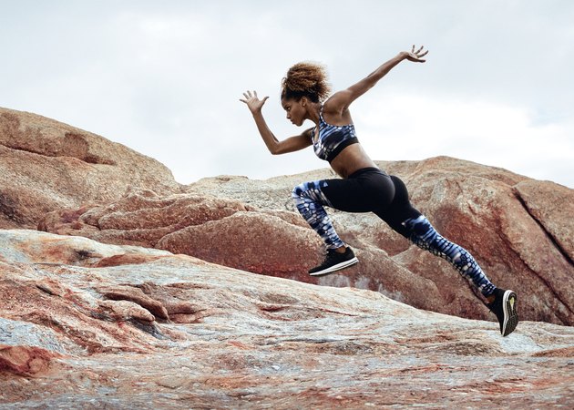 Female athlete running in nature