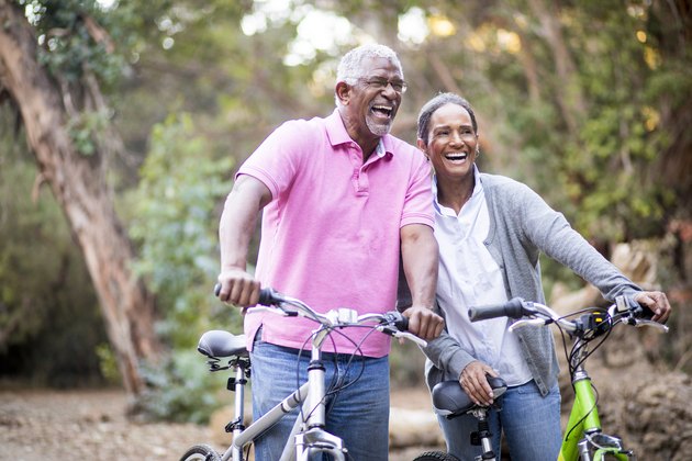 Senior African American Couple Riding Bikes