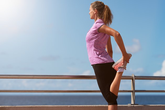 Sport woman doing stretching fitness exercise
