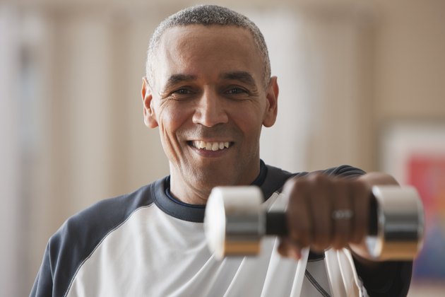 Man doing an upper-body superset during a weightlifting workout