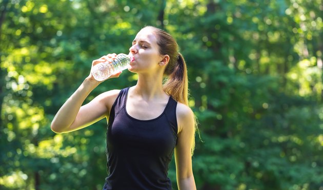Young woman with a water bottle