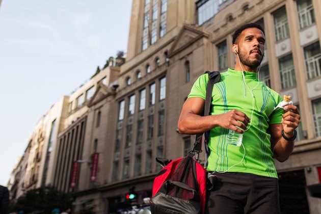 Young man walking around the city wearing sportswear