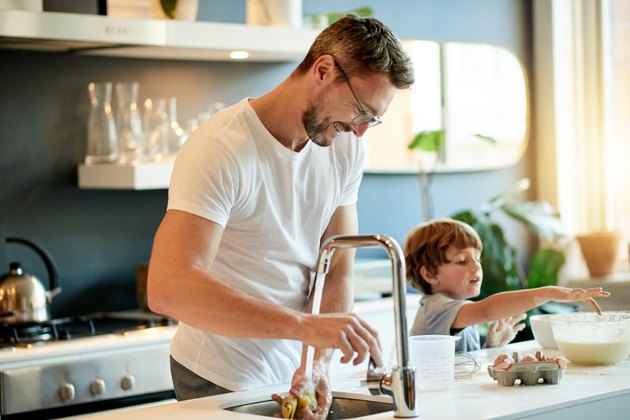 Man and child baking in the kitchen